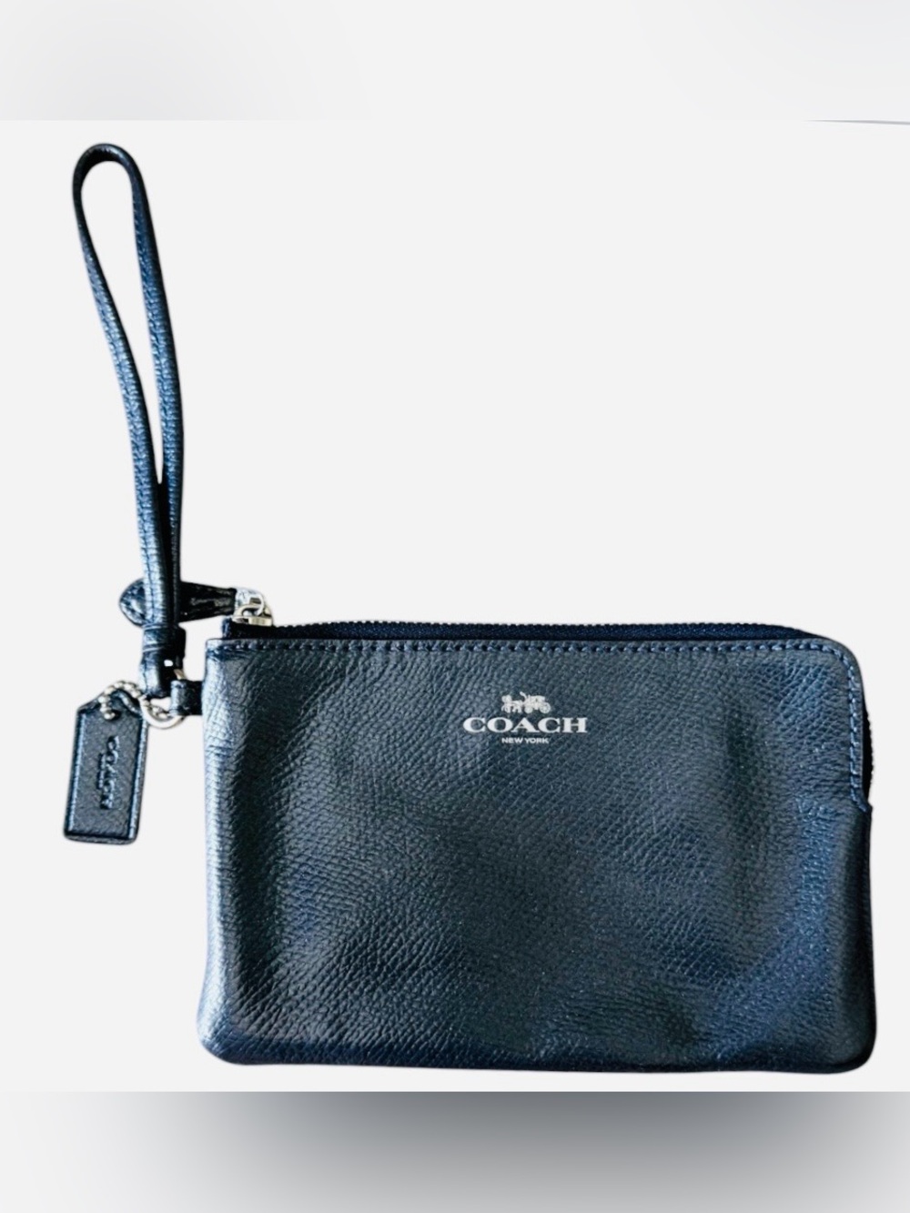 Coach dark blue leather corner zip wristlet with silver tone hardware